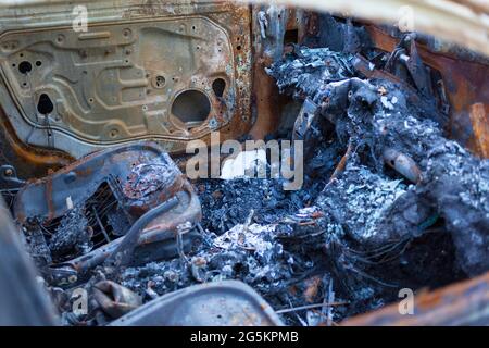Burnt out car wreck, Details, Germany, Europe Stock Photo