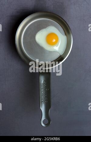 Quail egg in frying pan fried egg Stock Photo