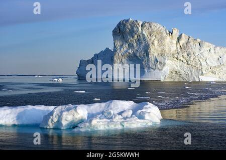 Icebergs in the midnight sun, Disko Bay, Ilulissat, Greenland, Denmark, North America Stock Photo