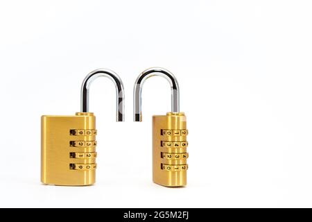 Code lock. Close-up of a combination lock with chrome numbers on a white background. Security concept. Stock Photo