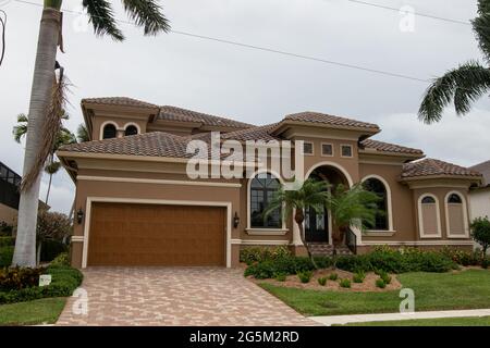 Typical private home at an affluent residential area on Marco Island, Florida. Stock Photo