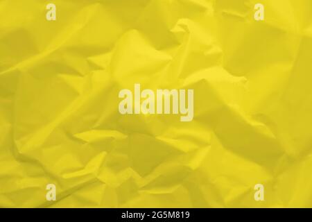 Texture Of Crumpled Yellow Paper For Design Background. Stock