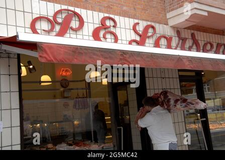 Copenhagen/Denmark/ 16th September  2015  Male from Mogens Nielsen Kreaturslageri delivers meat at danish famous P.E.Butcher butcher shop        (Phot Stock Photo