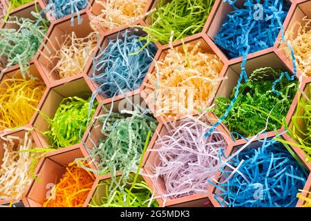 abstract multicolored hexagon patterned background with colored cut wrapping paper, abstract concept background Stock Photo