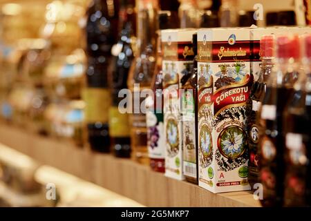 Kemer, Turkey - May, 25: Turkish delights, teas, sauces and souvenirs on the counters in the hypermarket. Turkish delights store. Blurred background Stock Photo
