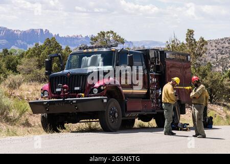 A heavy-duty International HV firefighting water tender truck on a the Pack Creek Fire in Utah. Stock Photo