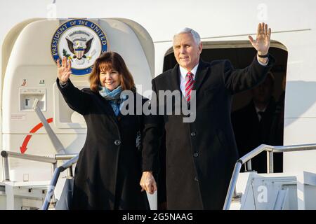 Feb 8, 2018-Songtan, South Korea-United States Vice President Mike Pence and Karen Pence arrives at Osan military air base in Songtan, South Korea.  Vice President Mike Pence is pushing South Korea to adopt a more hawkish stance toward the North, as he arrived in the country Thursday ahead of the Winter Olympics. Pence met with President Moon Jae-in to advocate a clear-eyed approach toward his bellicose, nuclear-armed neighbor, warning against North Korean 'propaganda' around the games. Athletes from both Koreas will compete as one team in the games opening Friday that senior officials from th Stock Photo