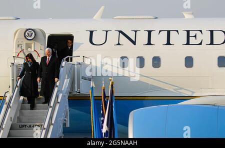 Feb 8, 2018-Songtan, South Korea-United States Vice President Mike Pence and Karen Pence arrives at Osan military air base in Songtan, South Korea.  Vice President Mike Pence is pushing South Korea to adopt a more hawkish stance toward the North, as he arrived in the country Thursday ahead of the Winter Olympics. Pence met with President Moon Jae-in to advocate a clear-eyed approach toward his bellicose, nuclear-armed neighbor, warning against North Korean 'propaganda' around the games. Athletes from both Koreas will compete as one team in the games opening Friday that senior officials from th Stock Photo