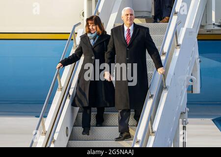 Feb 8, 2018-Songtan, South Korea-United States Vice President Mike Pence and Karen Pence arrives at Osan military air base in Songtan, South Korea.  Vice President Mike Pence is pushing South Korea to adopt a more hawkish stance toward the North, as he arrived in the country Thursday ahead of the Winter Olympics. Pence met with President Moon Jae-in to advocate a clear-eyed approach toward his bellicose, nuclear-armed neighbor, warning against North Korean 'propaganda' around the games. Athletes from both Koreas will compete as one team in the games opening Friday that senior officials from th Stock Photo