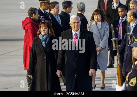 Feb 8, 2018-Songtan, South Korea-United States Vice President Mike Pence and Karen Pence arrives at Osan military air base in Songtan, South Korea.  Vice President Mike Pence is pushing South Korea to adopt a more hawkish stance toward the North, as he arrived in the country Thursday ahead of the Winter Olympics. Pence met with President Moon Jae-in to advocate a clear-eyed approach toward his bellicose, nuclear-armed neighbor, warning against North Korean 'propaganda' around the games. Athletes from both Koreas will compete as one team in the games opening Friday that senior officials from th Stock Photo