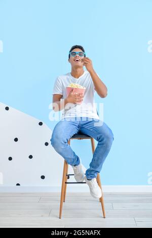 African-American teenager watching movie in room Stock Photo