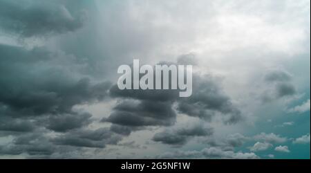 Panorama view of overcast sky. Dramatic gray sky and dark clouds before rain in the rainy season. Cloudy and moody sky. Storm sky. Cloudscape. Gloomy Stock Photo