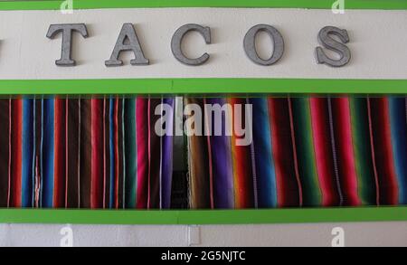 Closed Taco Stand With Colorful Curtains Stock Photo