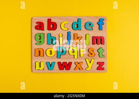 Learning letters. Website, video blog Yellow background Stock Photo