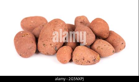 Expanded clay drainage isolated on white background. Whole brown clay pebbles. Stock Photo