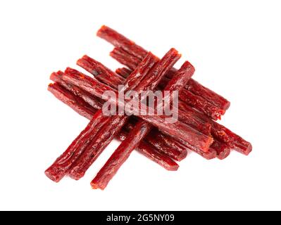 Dry salmon sticks isolated on white background. Dried fish snacks for beer. Stock Photo