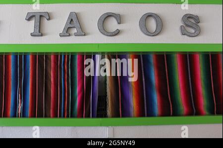 Closed Taco Stand With Colorful Curtains Stock Photo
