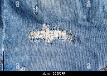 Destroyed denim hi-res stock photography and images - Alamy