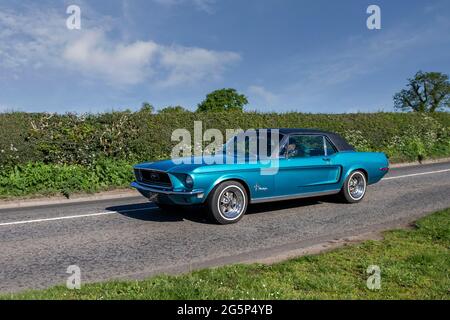 1968 60s sixties blue American Ford Mustang 4700 cc petrol 2dr cabrio,en-route to Capesthorne Hall classic May car show, Cheshire, UK Stock Photo