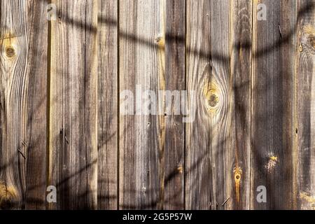 Old wooden plank texture background with traces of yellow paint Stock Photo