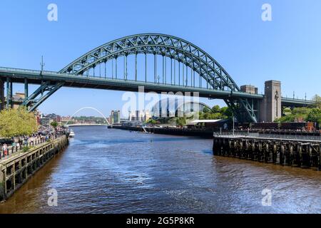 The Gateshead side of the River Tyne. In the shadow of the enormous Tyne Bridge. The area beneath is Träkol a riverside restaurant and bar.