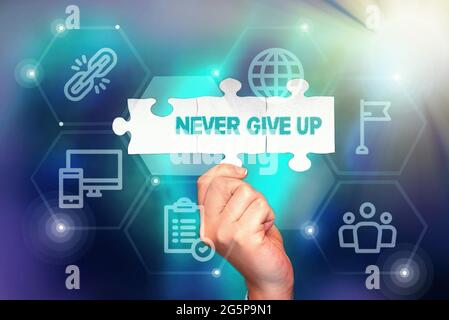 Hand writing sign Never Give Up. Business approach be persistent to keep on trying to improve the condition Inspirational business technology concept Stock Photo