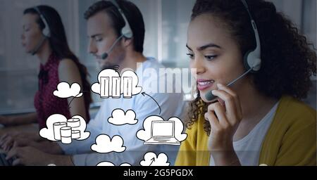 Composition of digital icons over business people using phone headsets Stock Photo