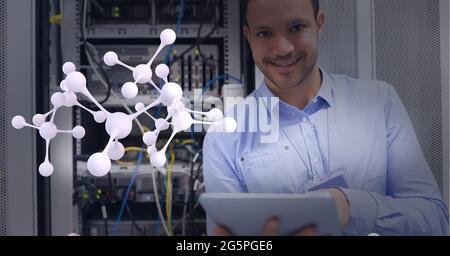 Composition of digital chemical compound over businessman using tablet by computer server Stock Photo