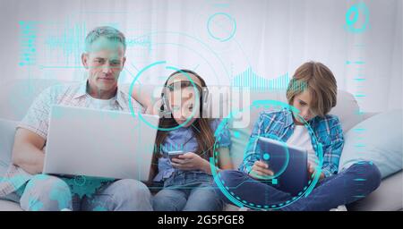 Composition of screen with digital data processing over family using electronic devices Stock Photo