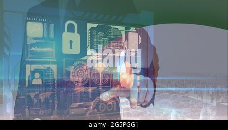Composition of businessman touching interactive screen with data processing Stock Photo