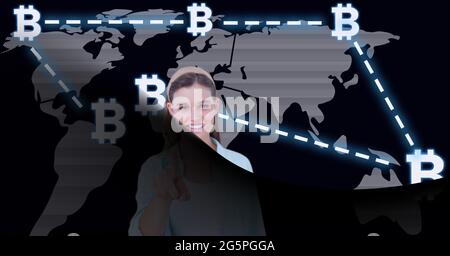 Composition of woman touching interactive screen with bitcoin symbols and world map Stock Photo