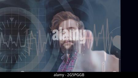Composition of businessman touching interactive screen with data processing Stock Photo