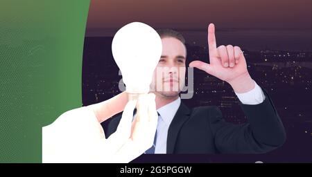 Composition of businessman touching interactive screen with lightbulb Stock Photo