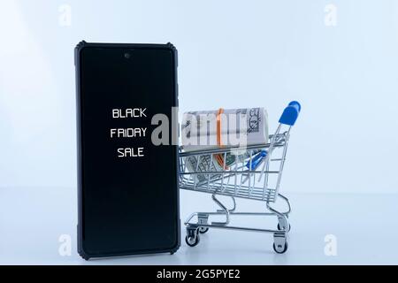 Black Friday Sale. Selective focus on a shopping cart. Sale Concept for template or poster Stock Photo