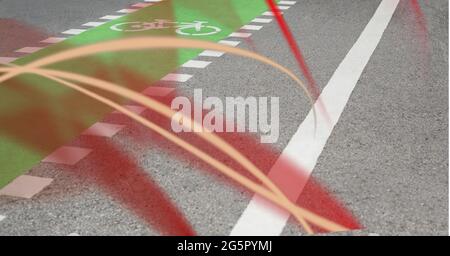 Red digital waves against close up view of pedestrian crossing on the road Stock Photo