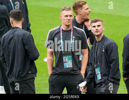 Germany goalkeeper Bernd Leno (centre) and Timo Werner (right) inspect the pitch before the UEFA Euro 2020 round of 16 match at Wembley Stadium, London. Picture date: Tuesday June 29, 2021. Stock Photo