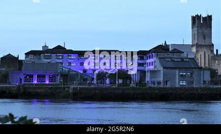 Limerick City, Ireland, River Shannon, Stroll through the city, Beauty all around the city, Flowers Statues Building River Swans Stock Photo