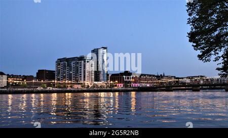 Limerick City, Ireland, River Shannon, Stroll through the city, Beauty all around the city, Flowers Statues Building River Swans Stock Photo