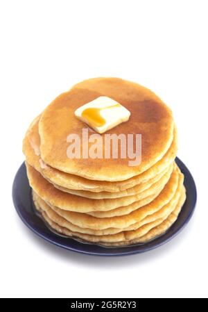 Stack of Freshly Made American Style Pancakes with Metling Butter Stock Photo