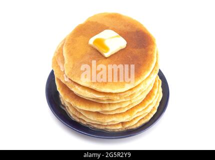 Stack of Freshly Made American Style Pancakes with Metling Butter Stock Photo