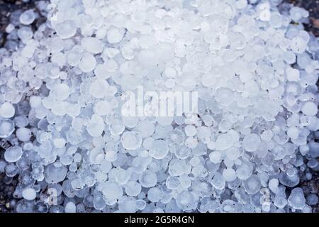 A pile of large hail on the ground Stock Photo