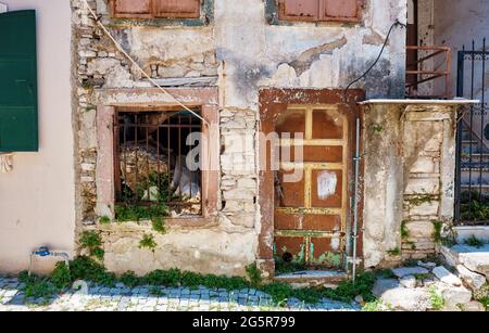 Exterior of a ruined abandoned traditional house in Urla, İzmir, Turkey. Stock Photo