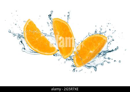 Orange fruit sliced with splashing water isolated on white background Stock Photo