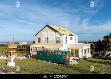 BETTYS BAY, SOUTH AFRICA - APRIL 12, 2021: A restaurant next to road R44 in Sunny Seas Estate at Bettys Bay in the Western Cape Province Stock Photo