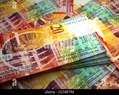 Money of Switzerland. Swiss franc bills. CHF banknotes. 20 francs. Business, finance, news background. Stock Photo