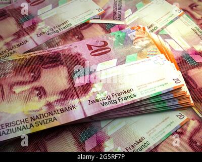 Money of Switzerland. Swiss franc bills. CHF banknotes. 20 francs. Business, finance, news background. Stock Photo