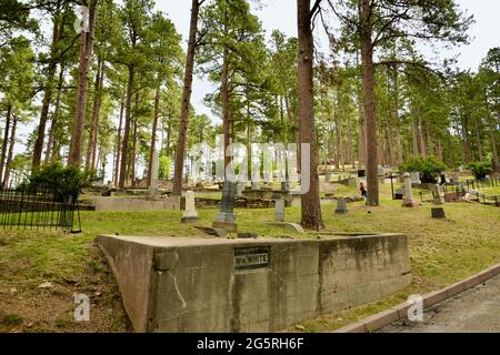 Green Pine trees and grass around cemetery plots or cemetery headstones. Deadwood Cemetery, Mount Moriah Cemetery (South Dakota) Stock Photo