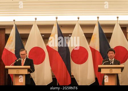 Philippine Foreign Affairs Secretary Teodoro Locsin, Jr., left, and his Japanese counterpart Toshimitsu Motegi attend a bilateral meeting in Manila, Philippines. Stock Photo