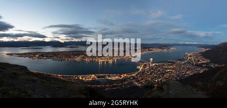 Night view of Tromso from Mount Storsteinen in Norway Stock Photo