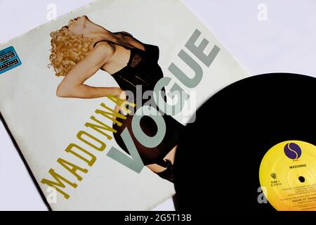 House dance artist, Madonna single music album on vinyl record LP disc. Titled: Vogue from the album I'm Breathless album cover Stock Photo